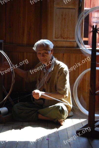 Myanmar Old Man Silk Spinning Traditionally