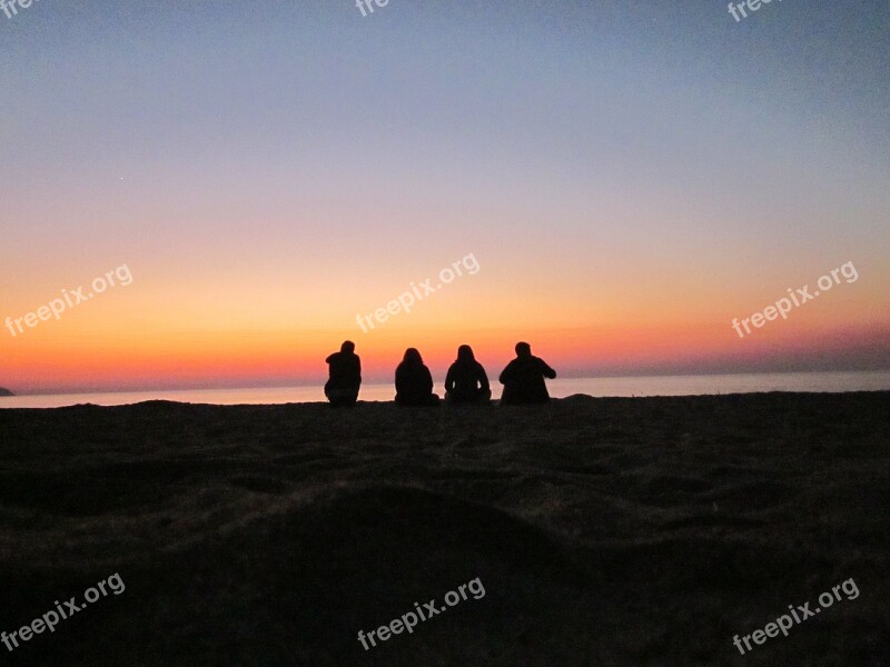 People Resting Silhouette Lake Sand