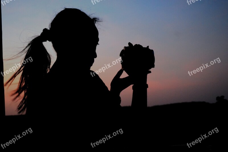 Photographer Female Silhouette Hair Camera