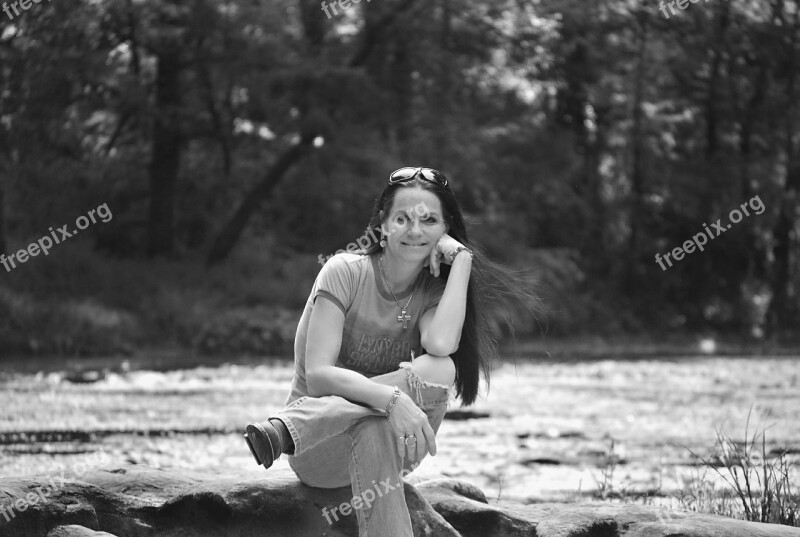 Woman Sitting Outdoors Water Rock