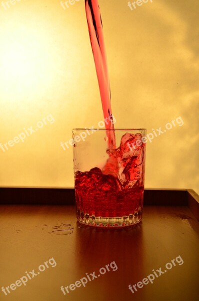 Splash Glass Liquid Red Pouring