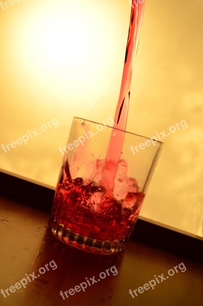 Splash Glass Liquid Red Pouring