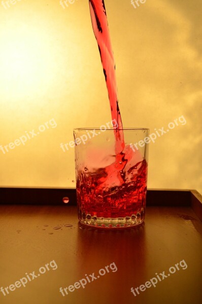 Splash Glass Liquid Red Pouring