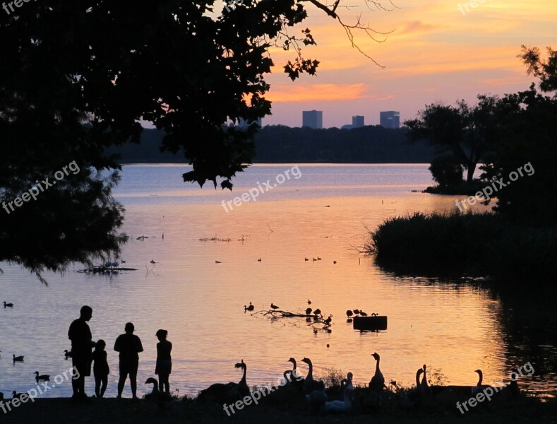 Sundown Lake Family Silhouette Water