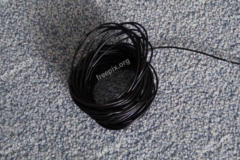 Lederband Cord Band Black Rolled Up