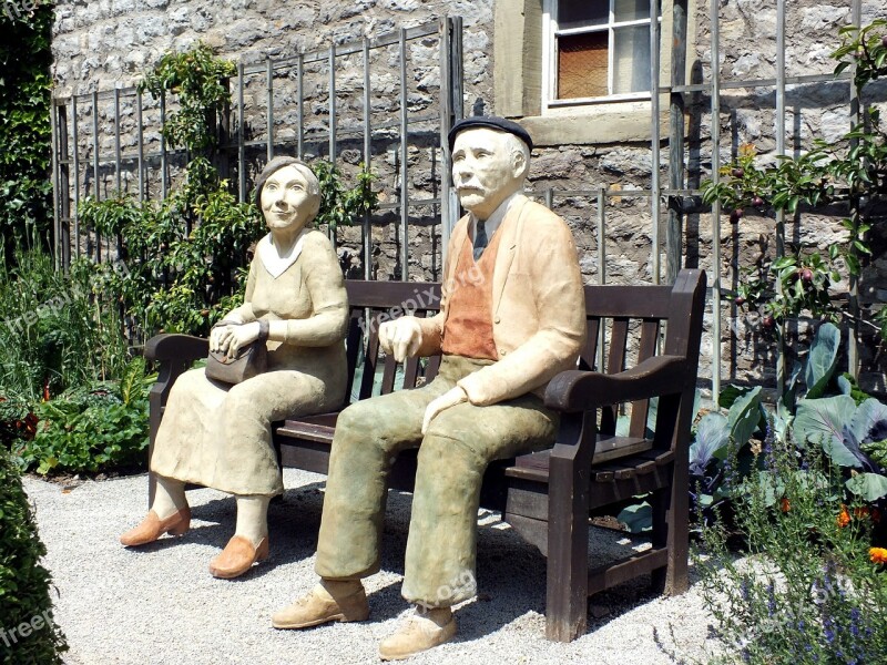 Rest Sculpture Man And Woman Pair Bank