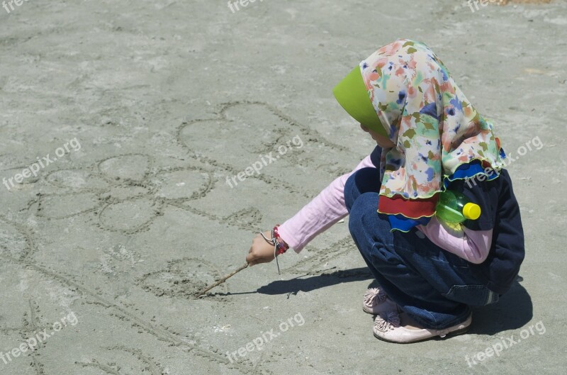 Muslim Girl Seaside Sand Play