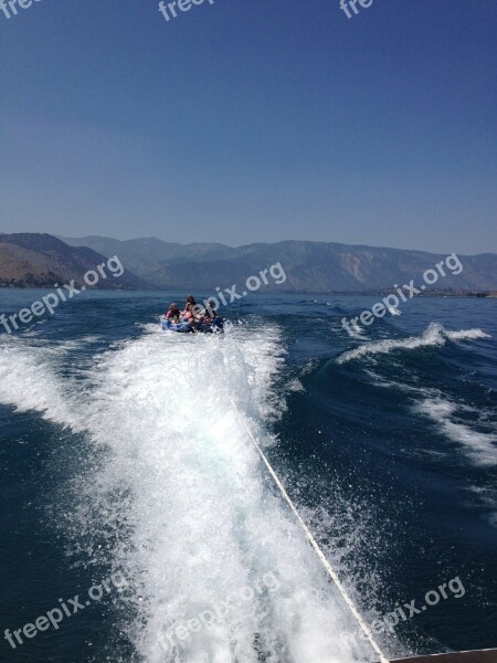 Blue Sky Water Lake Tubing Fun