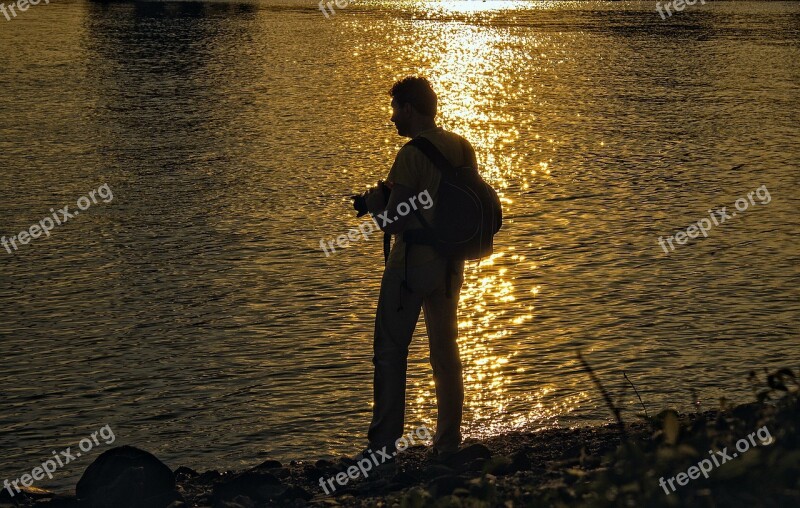 Photographer Camera Water Bank Sunset