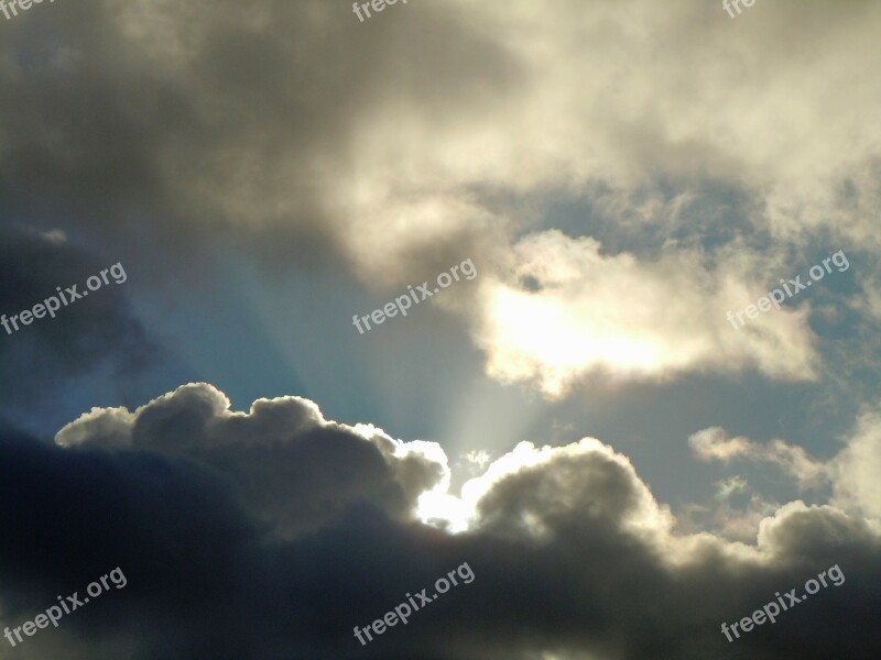 Clouds Sunbeam Rain Clouds Free Photos