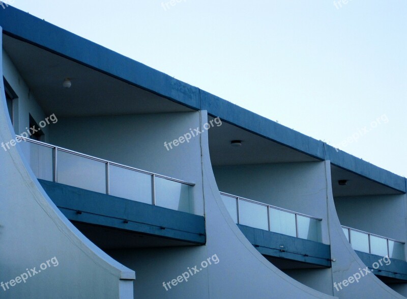 Building White Blue Curved Balconies