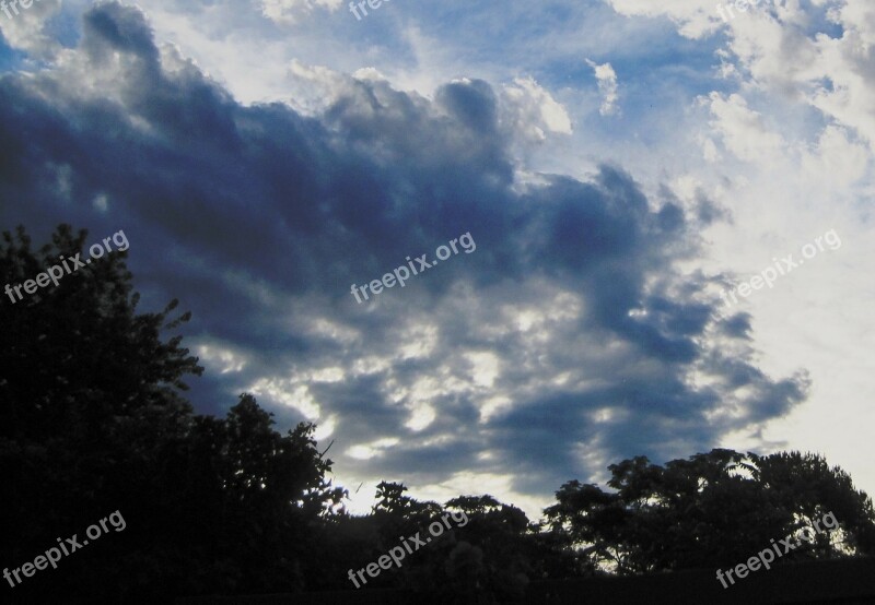 Cloud Spread Sun Shining Through Dark Shadow Bush And Trees Sky