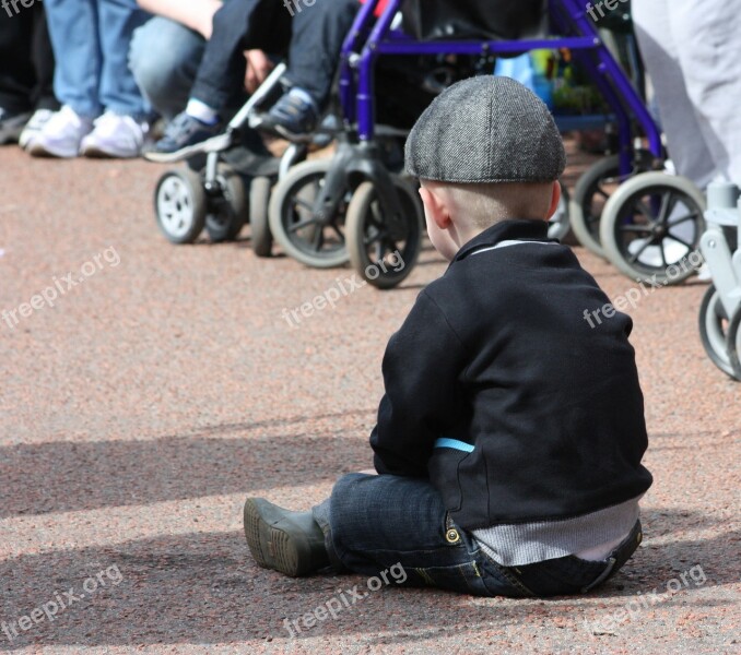 Ground Boy Child Hat Sitting