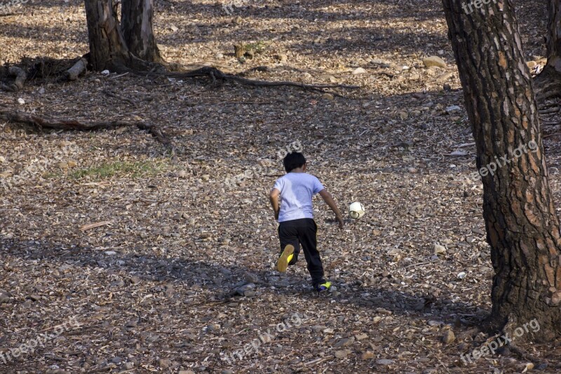 Child Playing Ball Free Photos