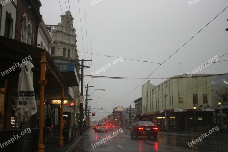 Rain Street Shops Wet Car