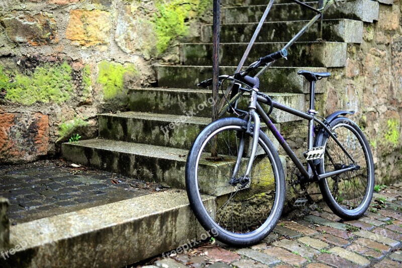 Bike Turned Off Stairs Downtown Road