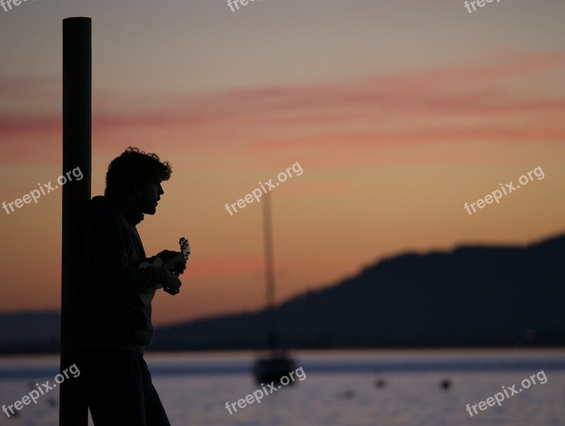 Sea Sunrise Guitar Player Man