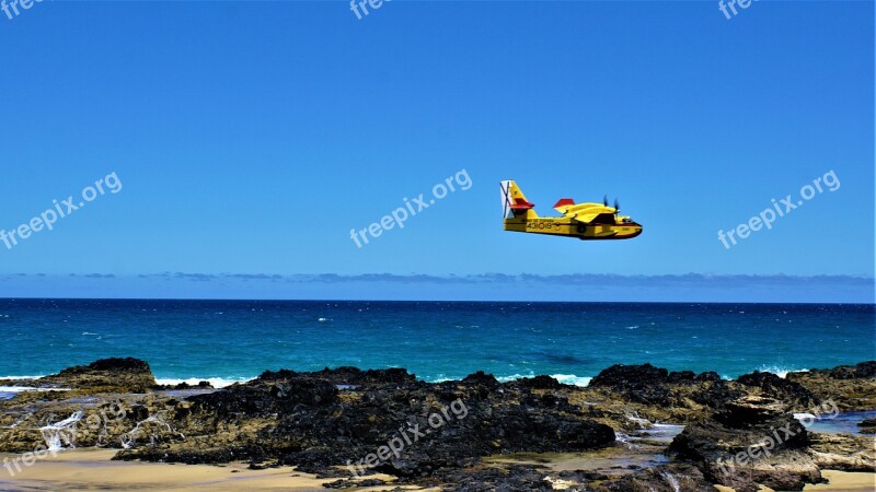 Light Aircraft Propeller Plane Ocean Sea Rock