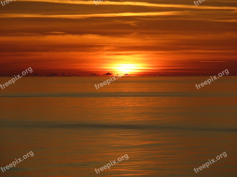 Sunset Ocean Waves Calm Red Sky Free Photos