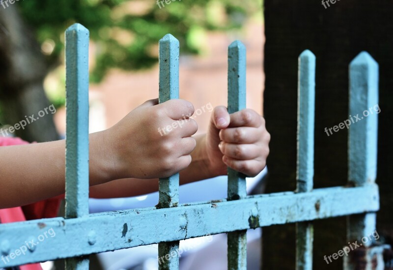 Hands Fence Demarcation Bars Hold Tight