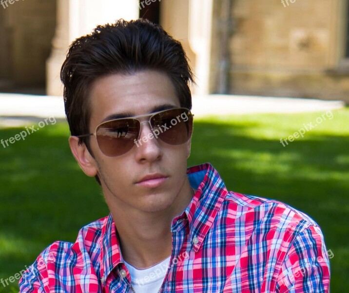 Young Man Contemplating Portrait People Sunglasses